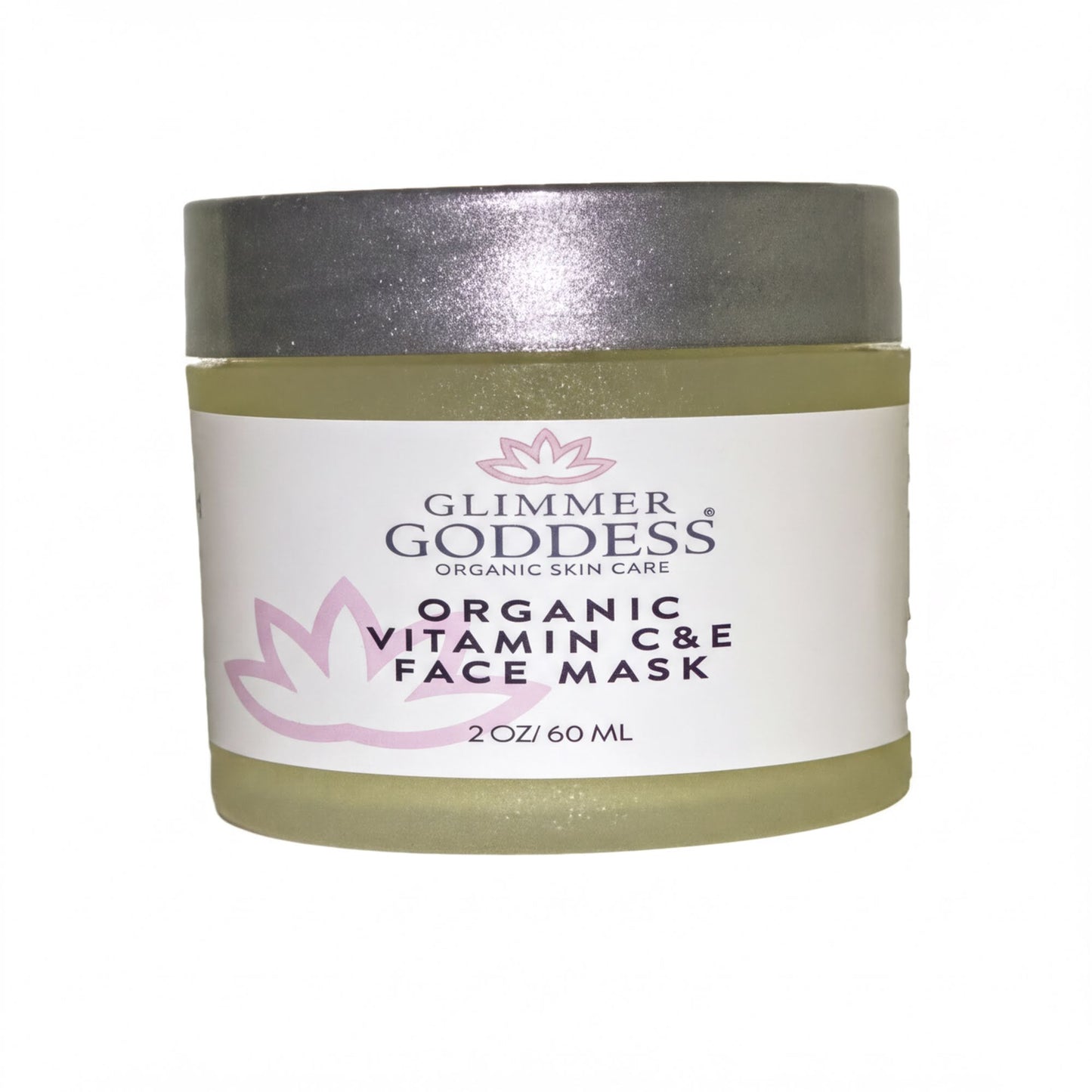 A jar of organic vitamin C and e face mask with a silver lid.
