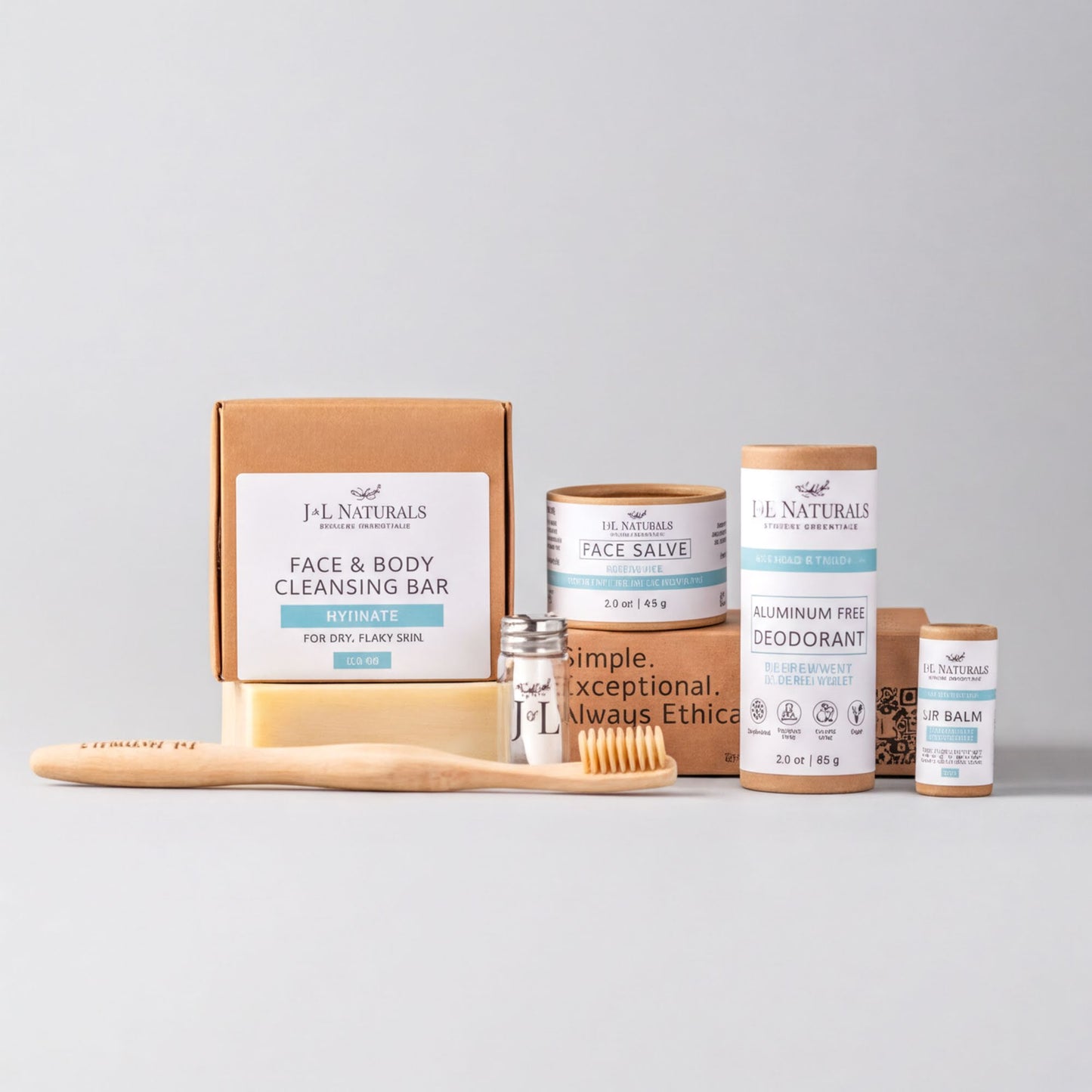 a collection of natural beauty products, including a face and body cleansing bar, a deodorant, a toothbrush, and some deodorant sticks.