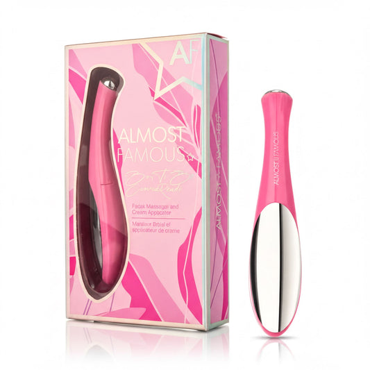 a pink box and a pink electronic device, likely a hair styling tool, with a pink and white color scheme.