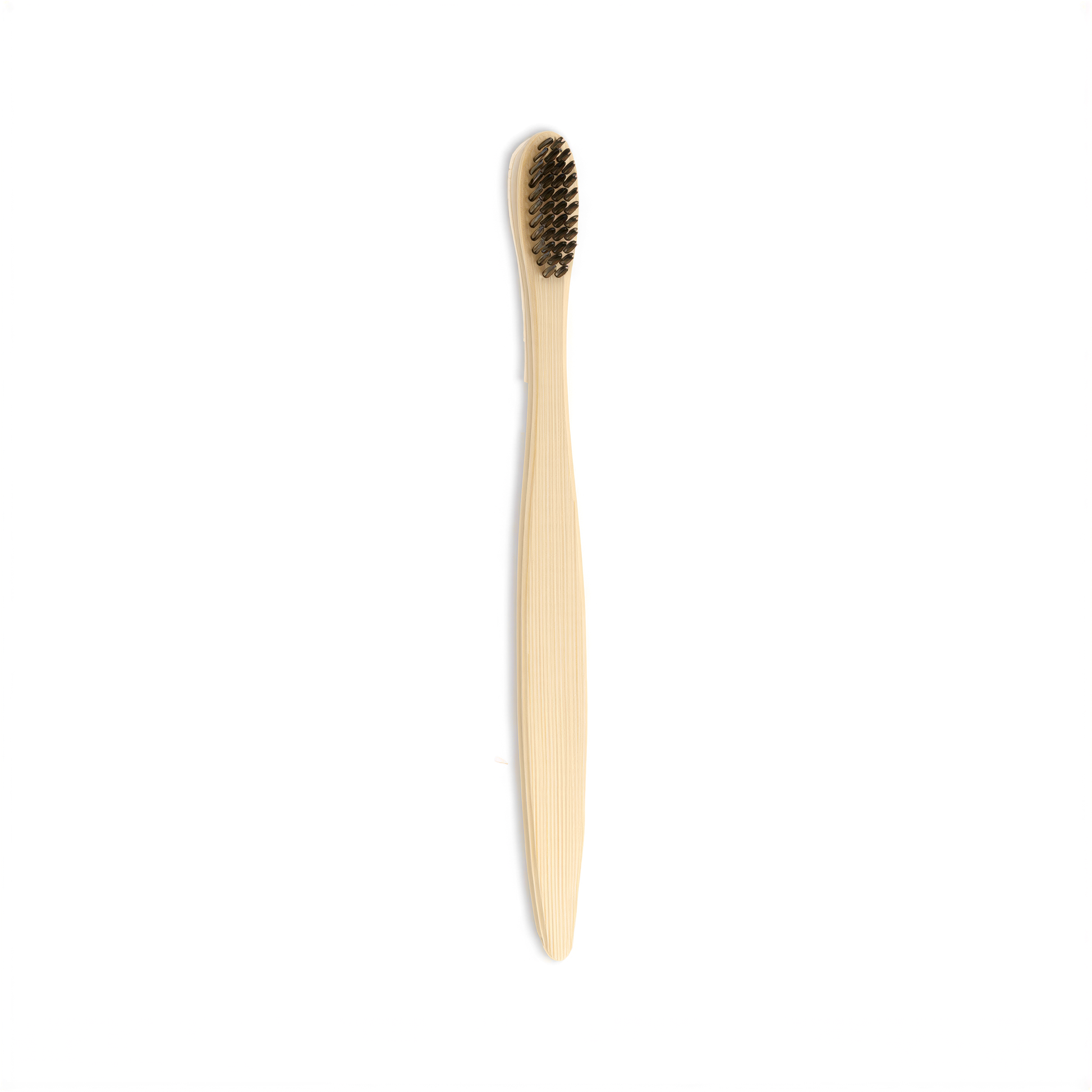 A wooden toothbrush with a black head is shown against a white background.