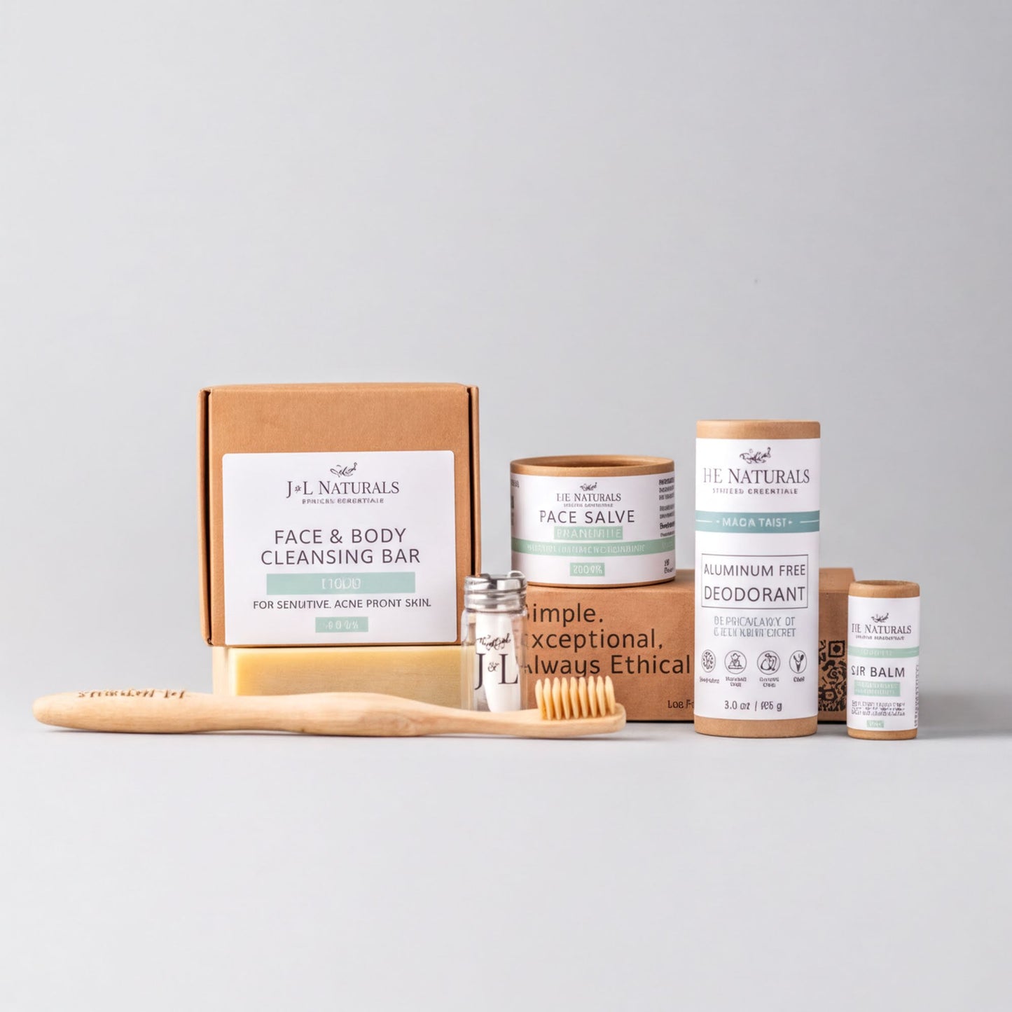 a collection of natural beauty products, including a face and body bar, a deodorant, a toothbrush, and some other items.