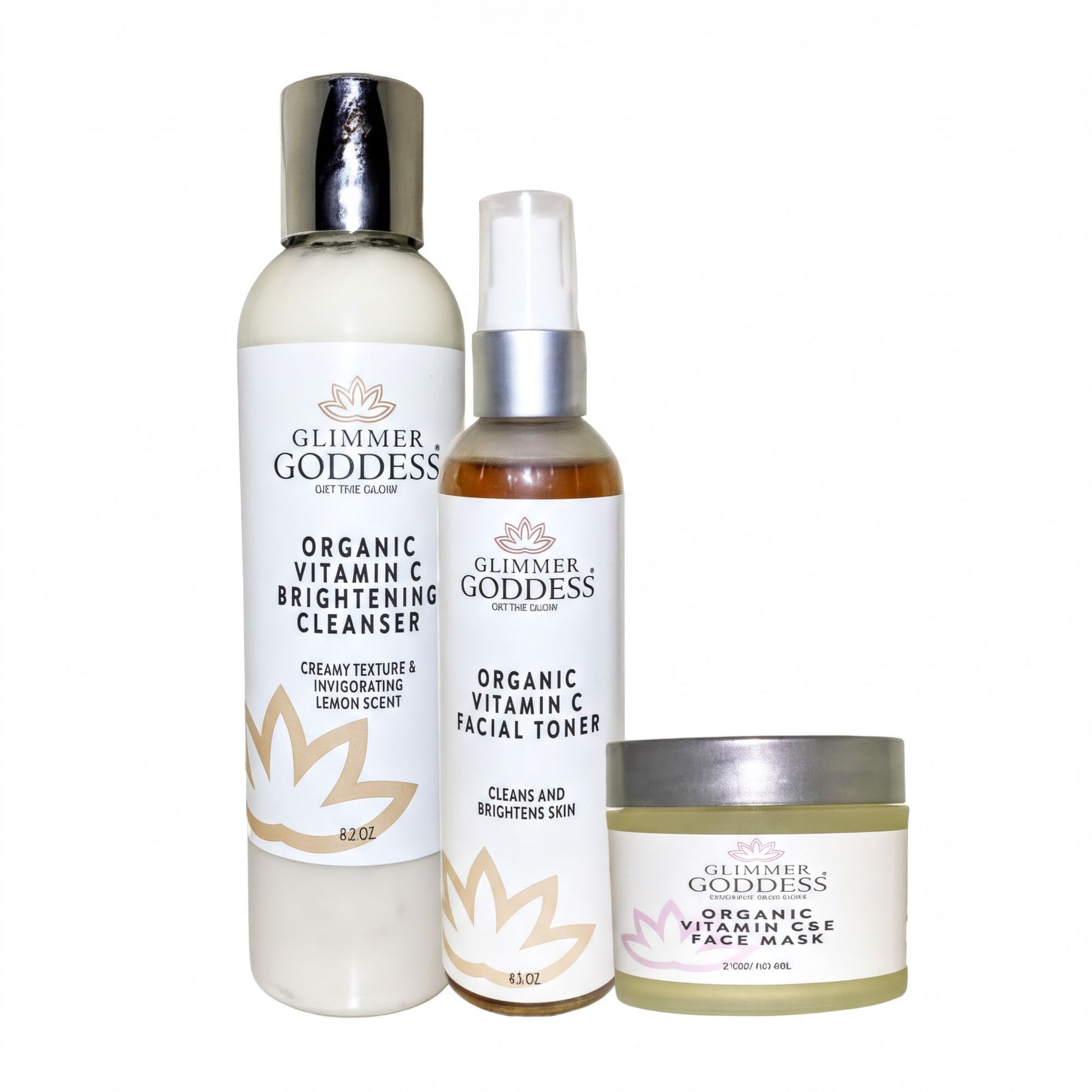 three beauty products from the brand "Glimmer Goddess" arranged in a row, with a focus on their organic vitamin C-based skincare line.